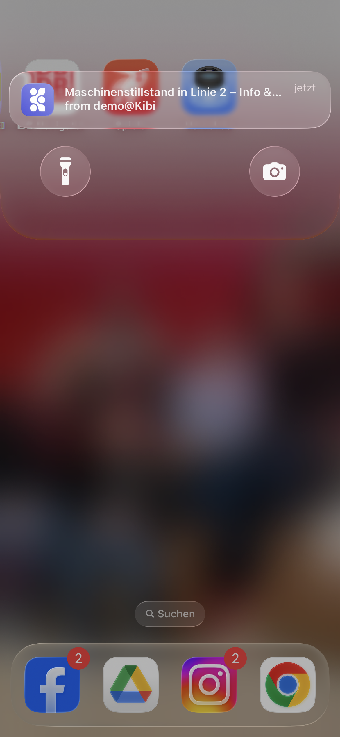 Kibi Connect push notification about machine downtime on a smartphone